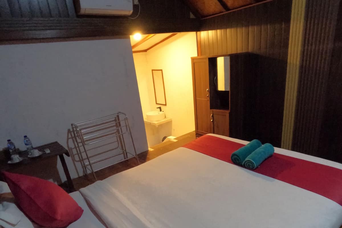 1 quarto, berços (sobretaxa), roupa de cama