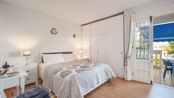 2 dormitorios, tabla de planchar con plancha, Internet y ropa de cama