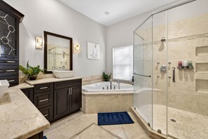 Shower, hair dryer, towels, shampoo