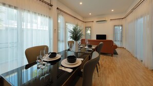 Luxury Room, Patio, Pool View | Living area - Thonglor Villa Hotel Chiang Mai (Chiang Mai)