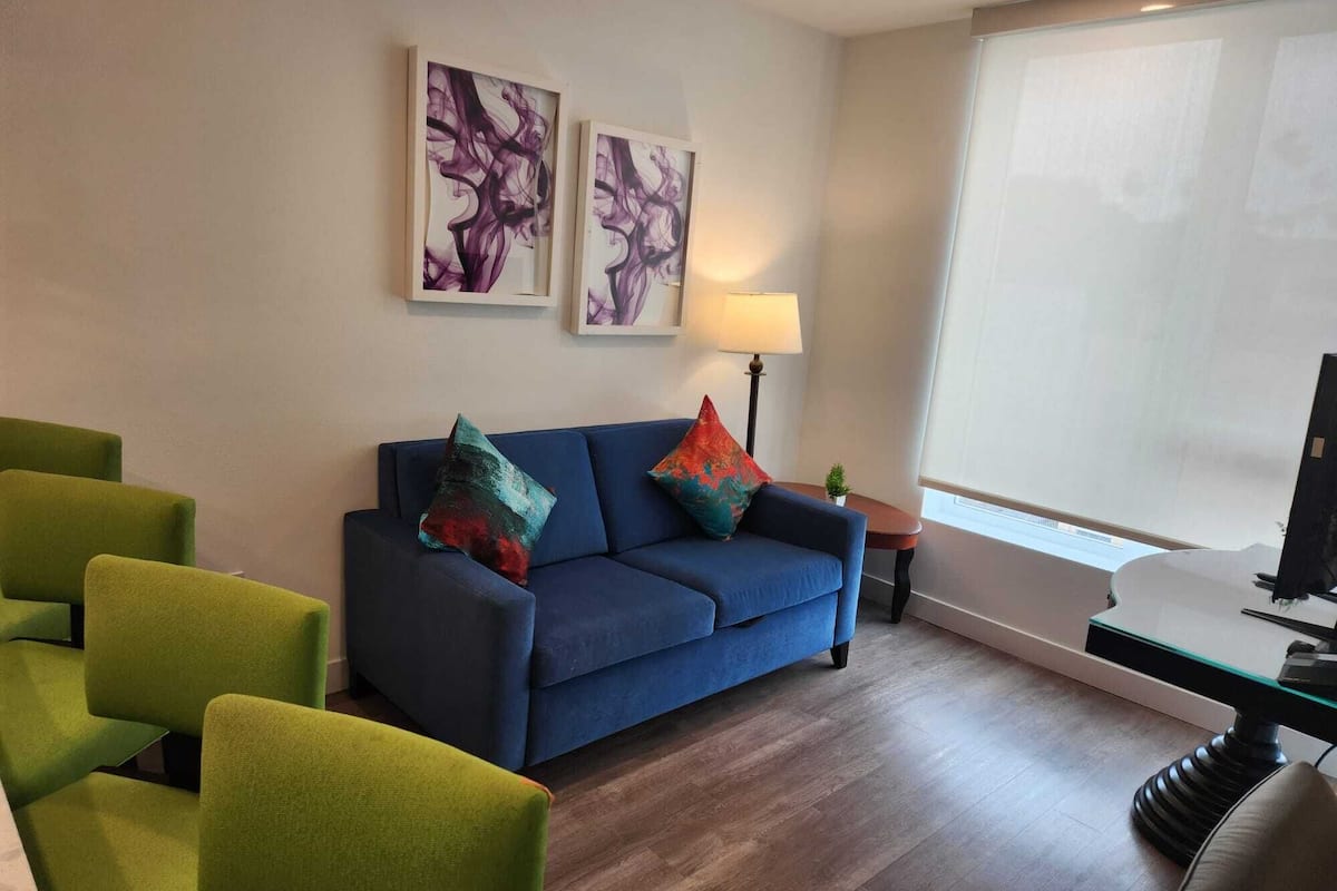 Suite, 1 Bedroom | Living area | 50-inch Smart TV with digital channels, Netflix, streaming services