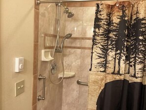 Shower, towels, soap, toilet paper