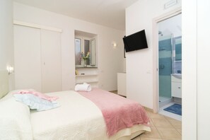 1 habitación, tabla de planchar con plancha, wifi y ropa de cama 