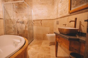 Suite | Bathroom | Hair dryer, slippers, towels, soap