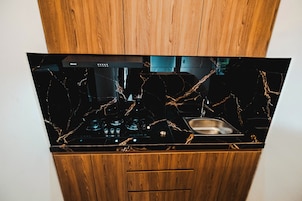 Superior Room | Private kitchen | Coffee/tea maker, mini-fridge, dishwasher, electric kettle