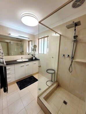 Shower, hair dryer, towels, soap