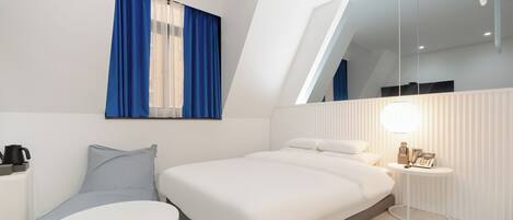 Standard Double B | Premium bedding, down comforters, desk, soundproofing