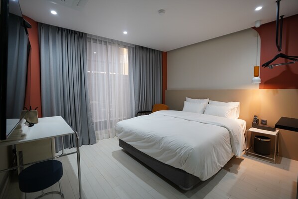 Premium bedding, down duvets, desk, soundproofing