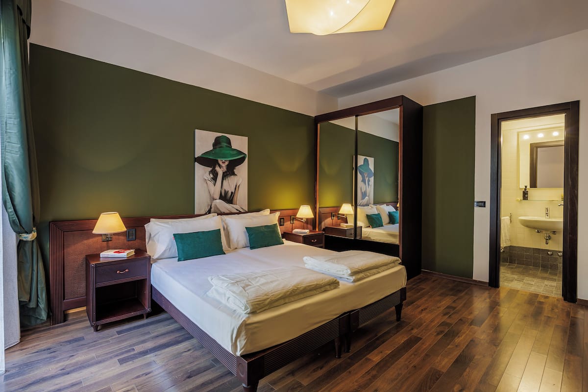 Desk, laptop workspace, free WiFi, bed sheets