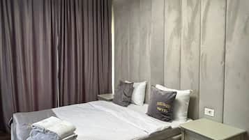 Ropa de cama de alta calidad y minibar