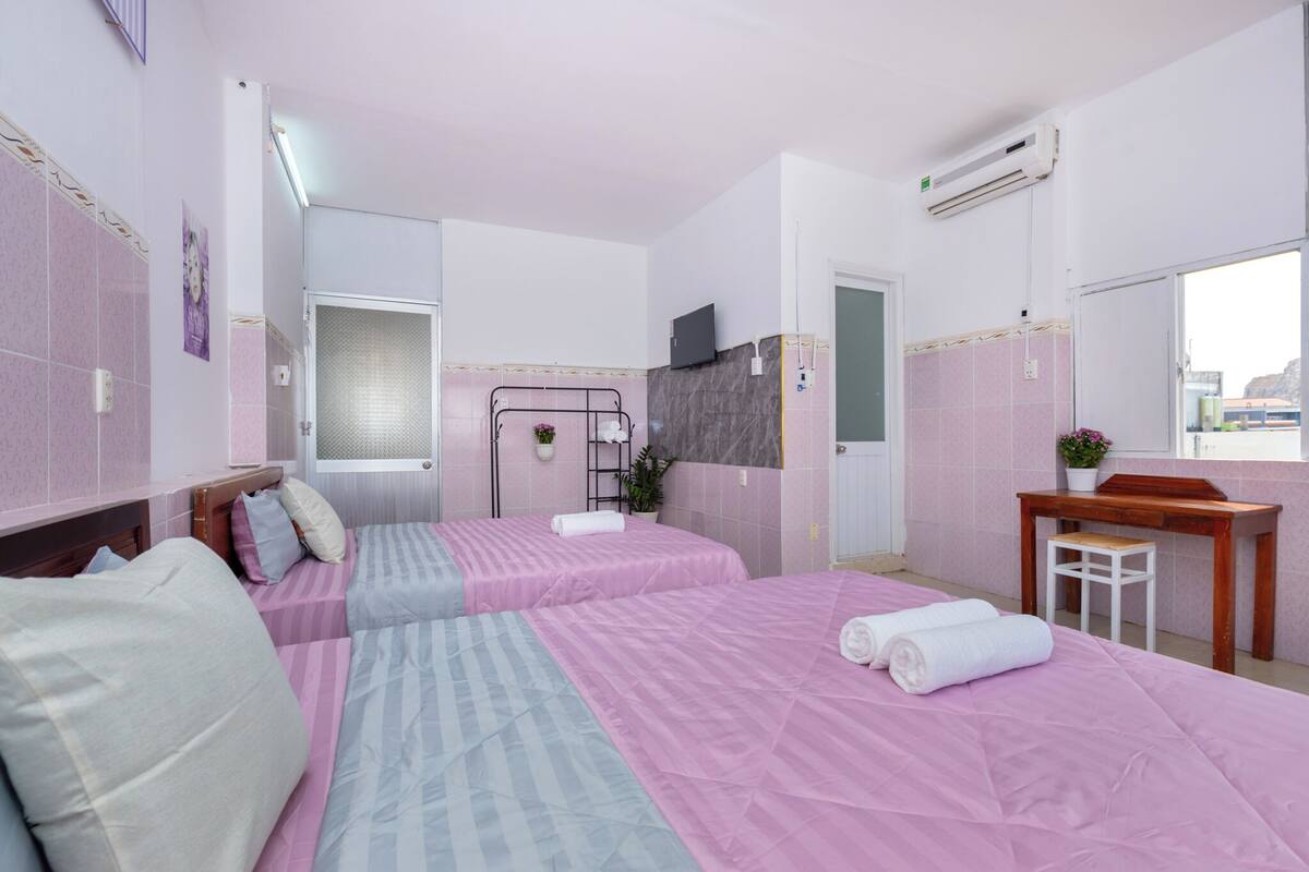 Premium bedding, desk, laptop workspace, free WiFi