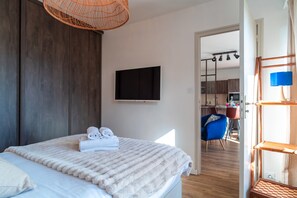 1 habitación, tabla de planchar con plancha, wifi gratis y ropa de cama 