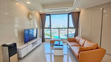Apartment, 3 Bedrooms, Balcony, City View | Living area | Flat-screen TV, Netflix, streaming services