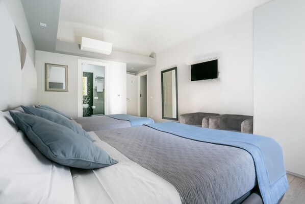 Quadruple Room, Courtyard View | In-room safe, iron/ironing board, free WiFi