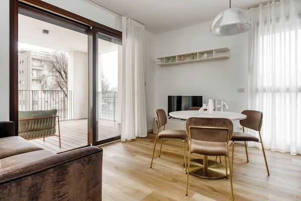 One-Bedroom Apartment with Terrace | Living area | 50-inch flat-screen TV with cable channels - Limehome Milan Park Towers (Milan)
