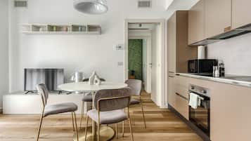 One-Bedroom Apartment with Sofa Bed | Living area | 50-inch flat-screen TV with cable channels