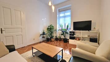 Apartamento, 1 quarto, para fumantes, vista para a cidade | Sala de estar