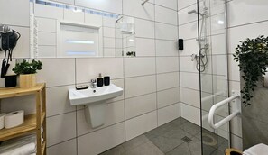 Suite estudio Confort | Baño | Secador de pelo y toallas