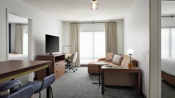 Desk, laptop workspace, free WiFi, bed sheets