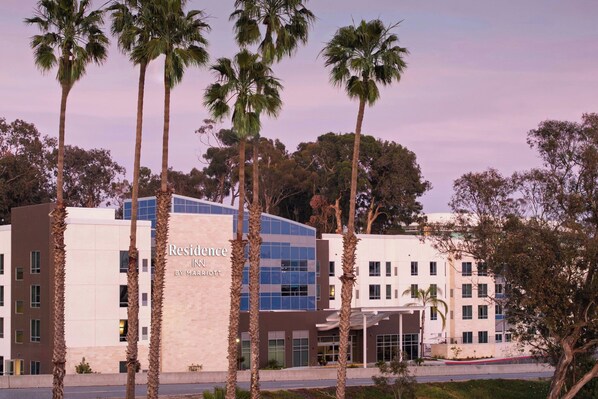 A modern building with a sign reading 'Residence IN by Marriott.'