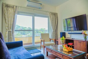 Apartment, 3 Bedrooms, Balcony, Pool View | Living area | Flat-screen TV - Alaya Stays Veera Marina 3 BHK Apartment (Candolim)