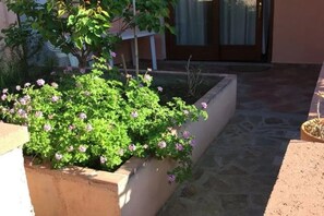 Apartment, 2 Bedrooms, Patio | Garden - Cozy Veranda Retreat Near Budoni (Budoni)