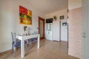 Apartment, 2 Bedrooms, Balcony | Dining room - Comfortable Flat Near Alghero Beach (Alghero)