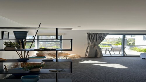 Relax by the Pool in This Stylish Batehaven Stay