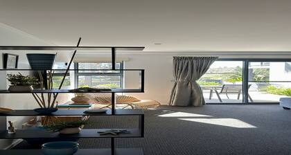 Relax by the Pool in This Stylish Batehaven Stay