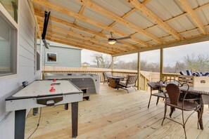 An outdoor deck with a pool table, seating area, and a hot tub. - 6 Mi to Lackland Afb: Hot Tub, Pool & Game Room! (San Antonio)