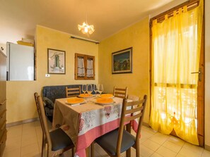 Apartment, 3 Bedrooms, Patio, Ocean View | Dining room - Holiday Home in a Secluded Location (Stintino)