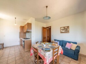 Apartment, 2 Bedrooms, Terrace, Garden View | Dining room - Holiday Home Near La Caletta Beaches (Siniscola)