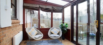 Three bedroom pet friendly detached property with conservatory and large lit decking area.