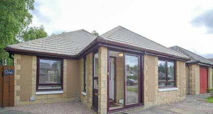 Aviemore three bedroom property on the edge of a beautiful Silver birch wood.