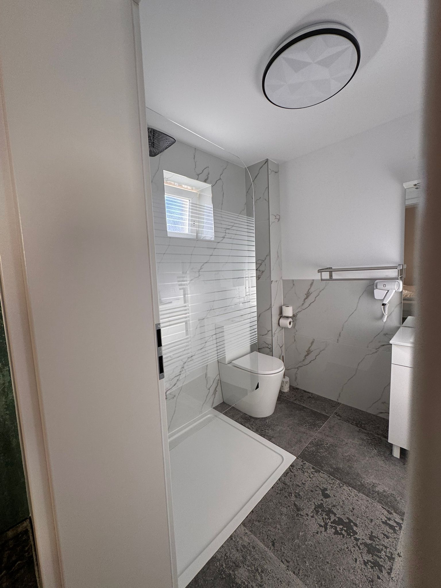 Classic Studio | Bathroom | Shower, hair dryer, towels, soap