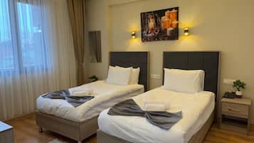 Basic Twin Room, City View | In-room safe, desk, laptop workspace, soundproofing