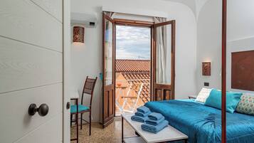 Comfort Room, Multiple Beds, Balcony | Blackout curtains, free WiFi