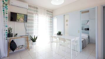 2 dormitorios, tabla de planchar con plancha, wifi y ropa de cama