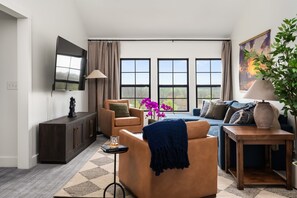 Smart TV, fireplace, foosball, books