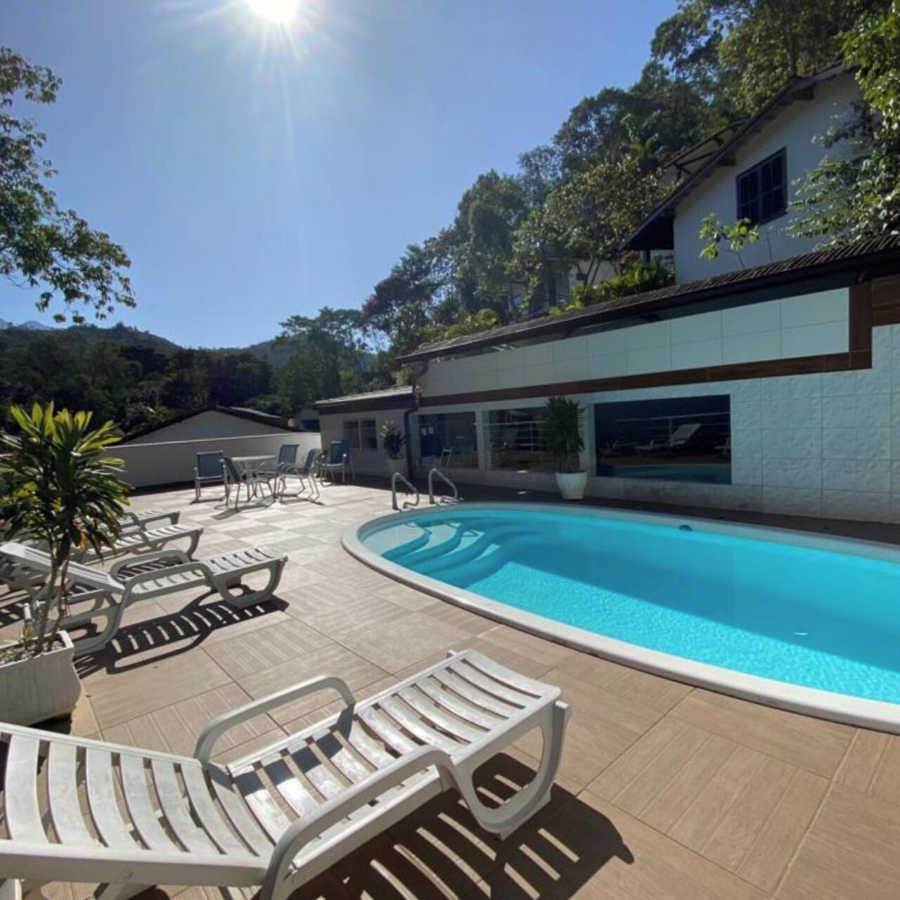 Indoor pool, outdoor pool, pool umbrellas, sun loungers