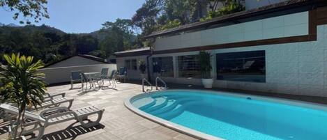 Indoor pool, outdoor pool, pool umbrellas, sun loungers