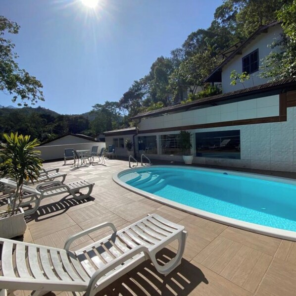 2 outdoor pools, pool umbrellas, pool loungers