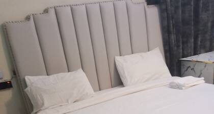 Vitaluxury is a secured apartment with 5min drive to airport with 2hrs power s