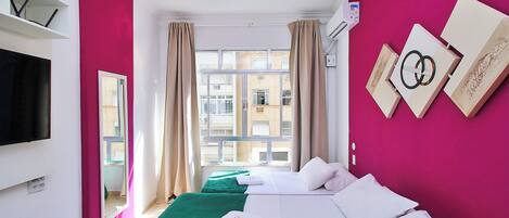 Economy Studio, Partial Ocean View | Blackout drapes, iron/ironing board, free WiFi