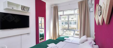 Economy Studio, Partial Ocean View | Blackout drapes, iron/ironing board, free WiFi