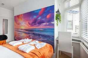 4 habitaciones, tabla de planchar con plancha, wifi y ropa de cama
