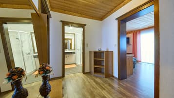 Basic Apartment, 2 Bedrooms, Balcony, Mountain View | Living area | 50-inch flat-screen TV with cable channels