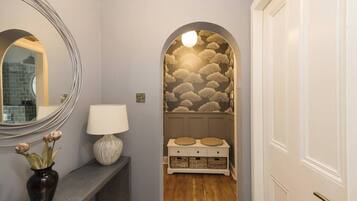 Family Apartment, City View | Living area | 24-inch flat-screen TV with cable channels