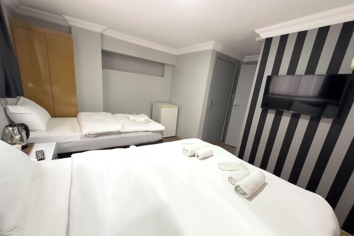 Triple Room | Premium bedding, iron/ironing board, free cots/infant beds, free WiFi