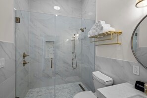 Shower, hair dryer, towels